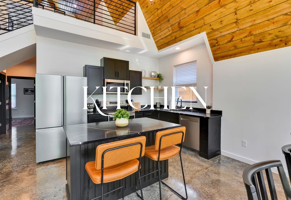 The open kitchen and dining layout make cooking, gathering, and sharing meals feel easy, warm, and connected.