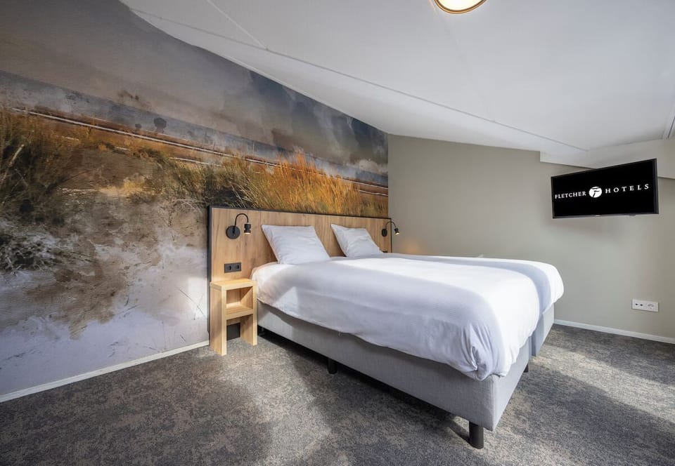 Unit with 2 single beds and 1 double bed. Exact unit will be assigned upon arrival. Views, colors, and decor may vary.