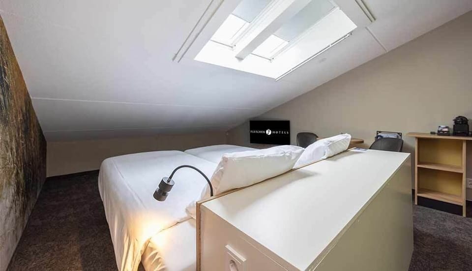 Unit with 2 Single Beds. Exact unit will be assigned upon arrival. Views, colors, and decor may vary.
