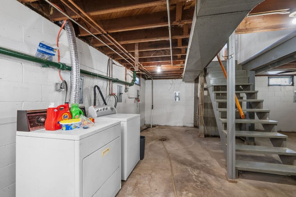 Turn the corner from the kitchen down to the clean and bright basement. You will have unlimited access to the washer and dryer throughout your stay with laundry detergent provided.