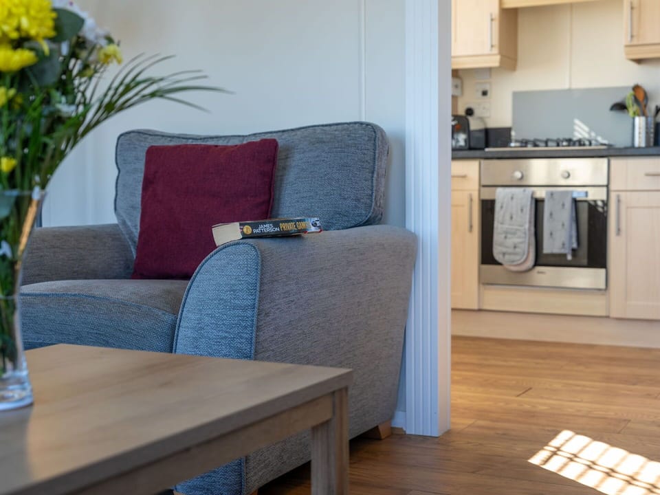 Furniture, Interior Design, Flooring, Floor, Wood, Room, Couch, Table, Chair, Apartment