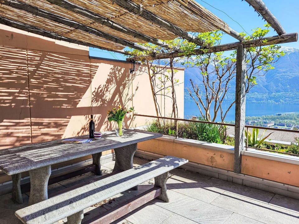 Furniture, Outdoor Furniture, Chair, Outdoor Table, Shade, Balcony, Deck, Hardwood, Kitchen & Dining Room Table, Flowerpot