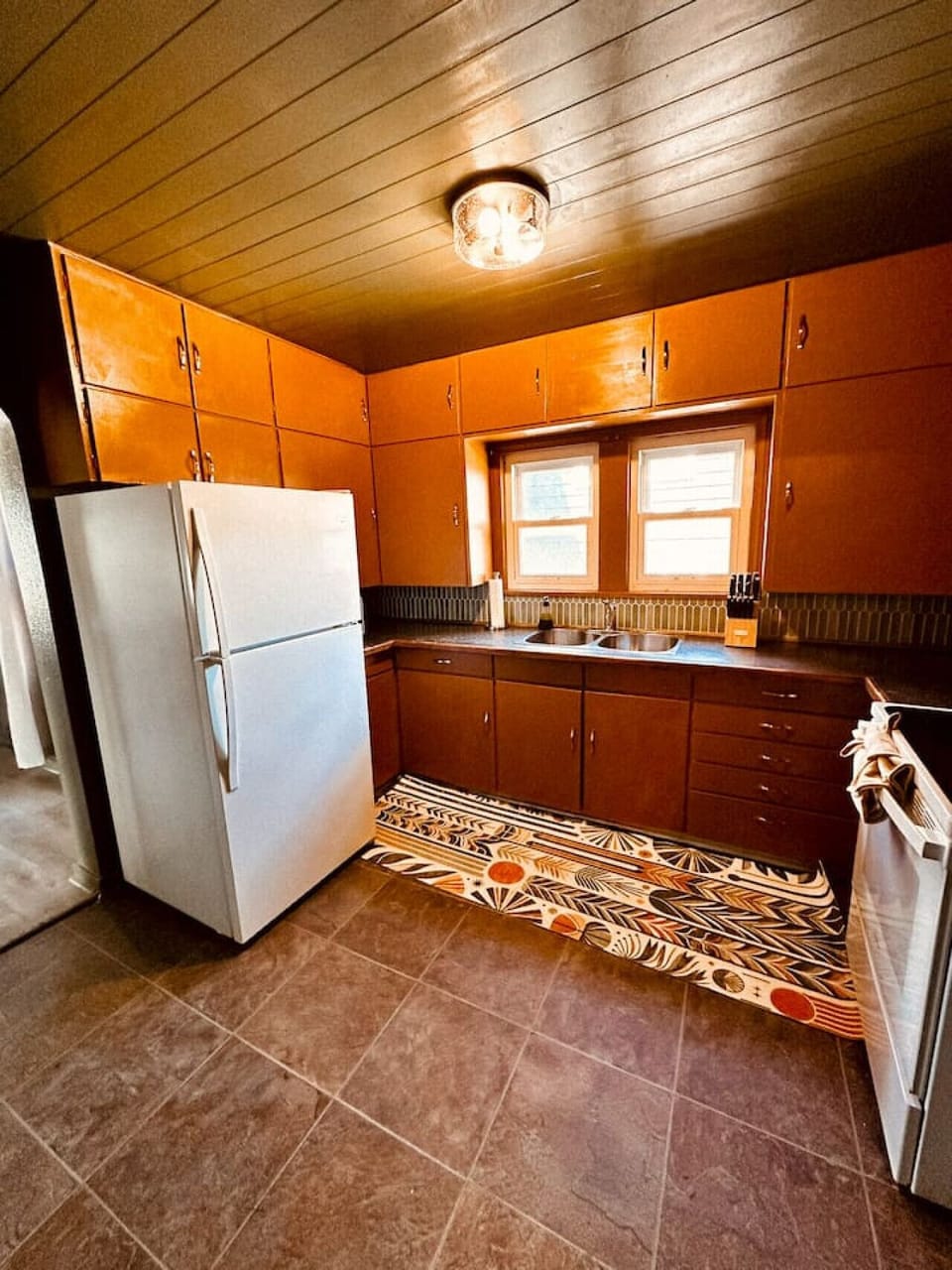 Fully equipped kitchen with vintage charm, perfect for home-cooked meals