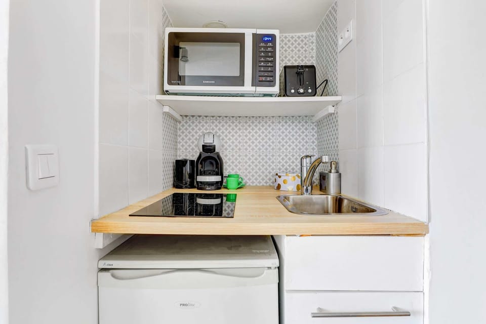 The kitchen is fully equipped to prepare a simple meal