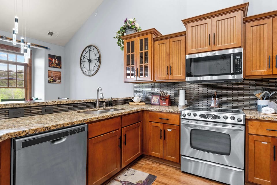 The inviting kitchen offers ample space & every home comfort