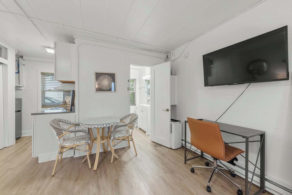 Sip morning coffee or grab a bite at the dining table, seating 2
