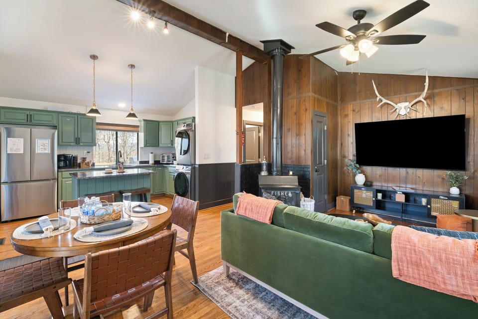 The living room area, dining area, and kitchen area.