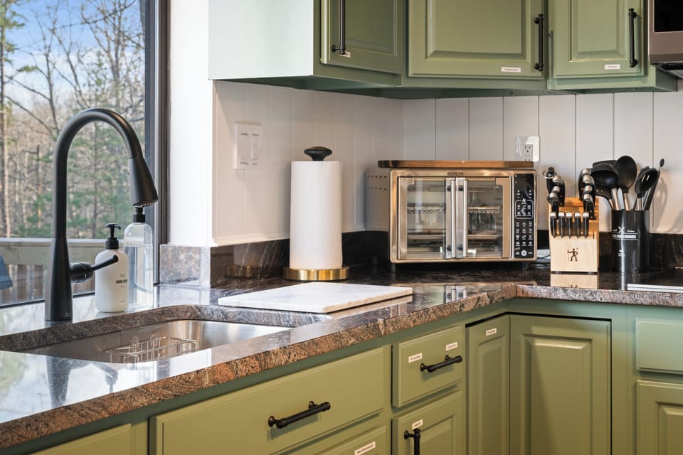 The kitchen sink and the convection oven. (No full-sized oven available and dishwasher)