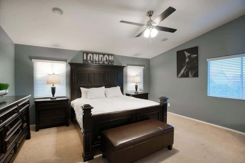 Bedroom Three | The London Luxe | Upstairs King Bedroom with Luxurious Ensuite Bathroom, Spacious Walk-in Closet and Smart TV
