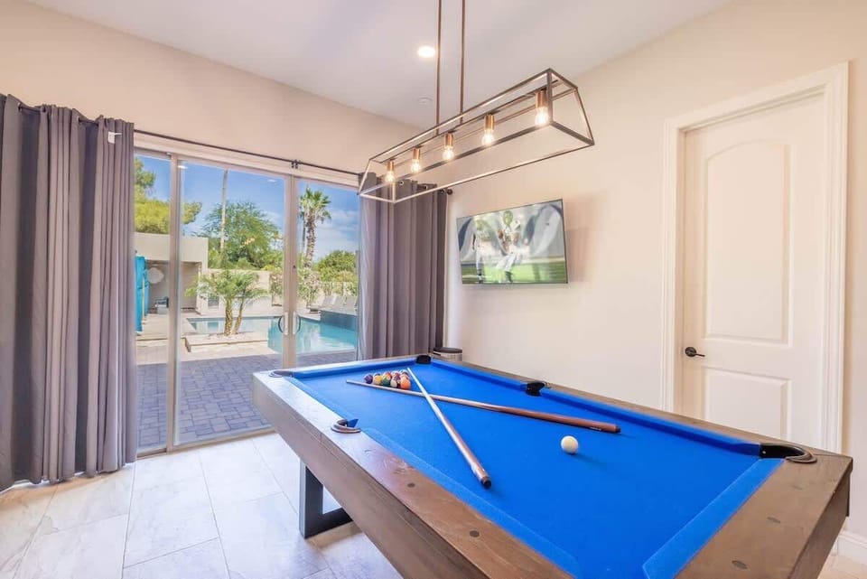 Game on indoors, splash out back. Easy fun.
