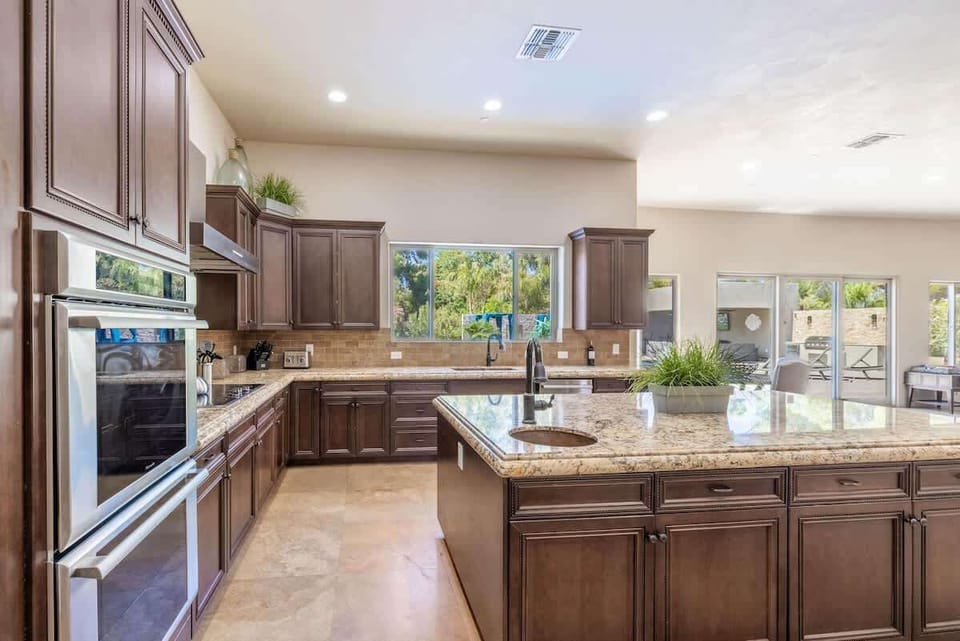 Cook up good times. This kitchen has room for your whole gang to eat.