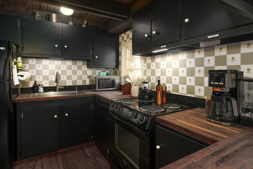 Vintage-inspired kitchen stocked for easy cooking and morning coffee.