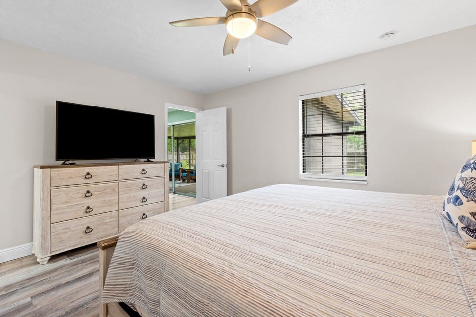 Master bedroom with a king bed