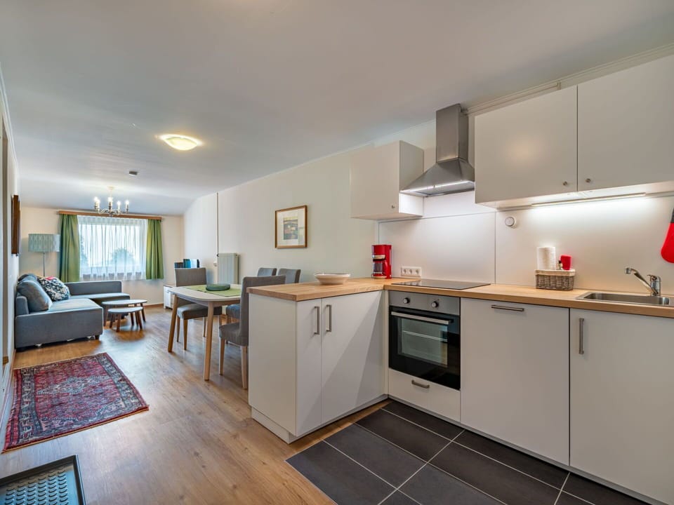 Interior Design, Flooring, Ceiling, Floor, Furniture, Kitchen, Room, Countertop, Table, Cabinetry