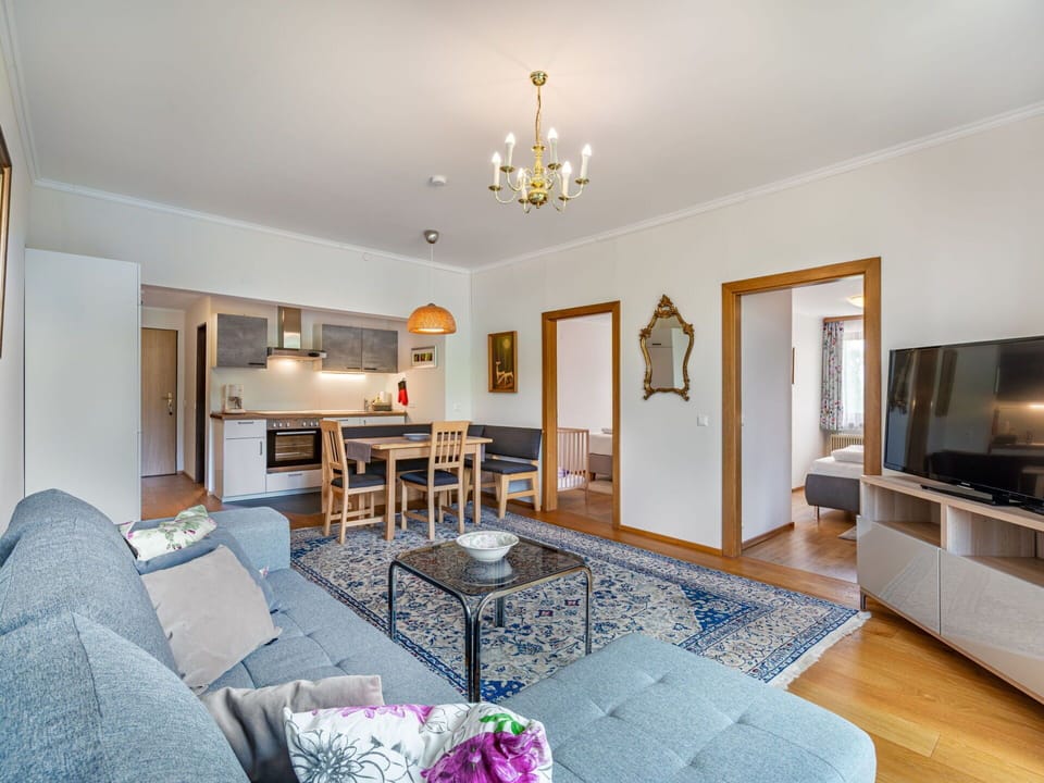 Furniture, Interior Design, Flooring, Couch, Floor, Ceiling, Room, Wood, Living Room, Table