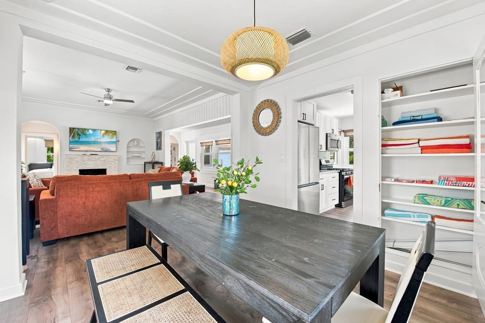 Open-concept dining and living space flowing seamlessly into the kitchen.