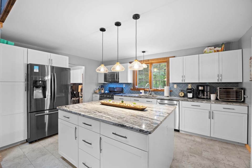 Large island for cooking and within easy reach of everything you need to make a home cooked meal. 