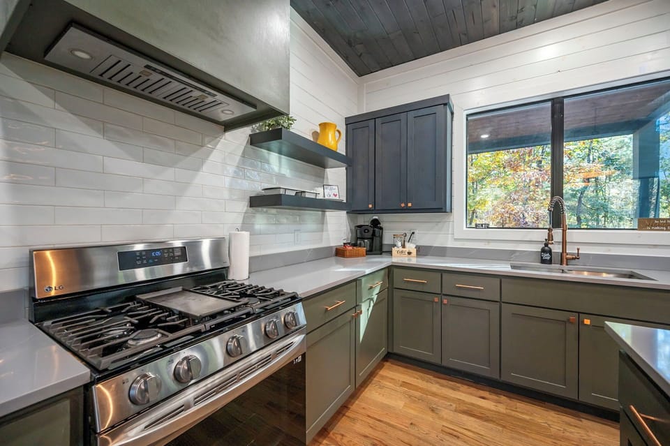 Kitchen has a view of the outdoor area