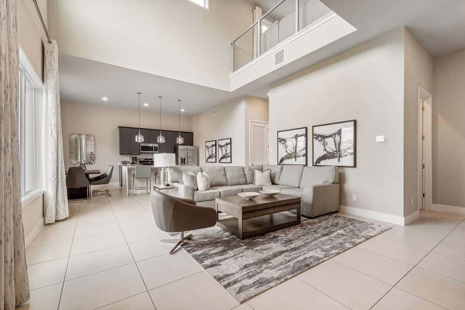 Stay in this elegant, open-concept loft with soaring ceilings and chic décor. Enjoy a fully equipped kitchen, cozy living area, and serene views. Perfectly located near top attractions, dining, and entertainment. Relax in style—book your getaway now!