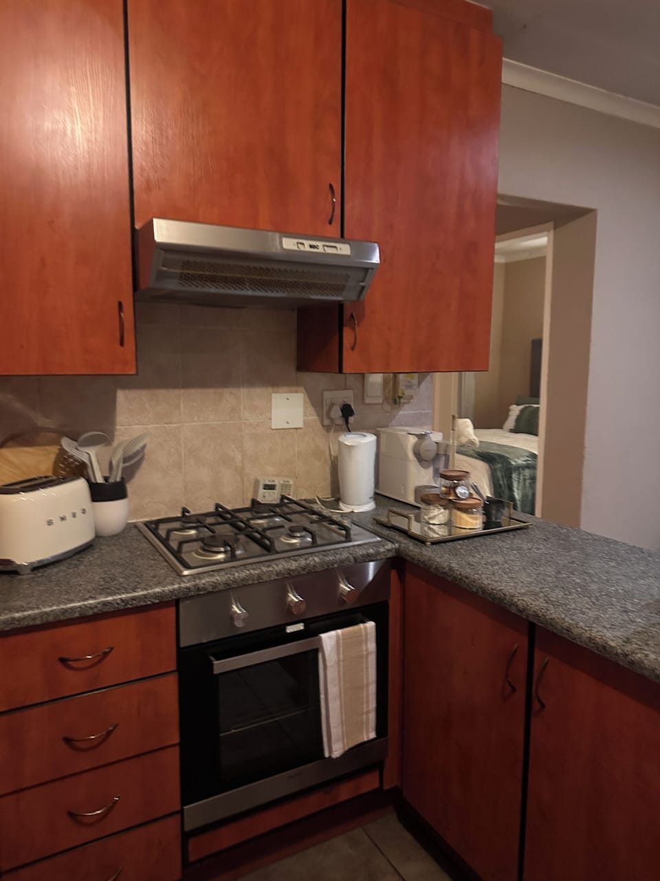Gas powered stove with electrical oven