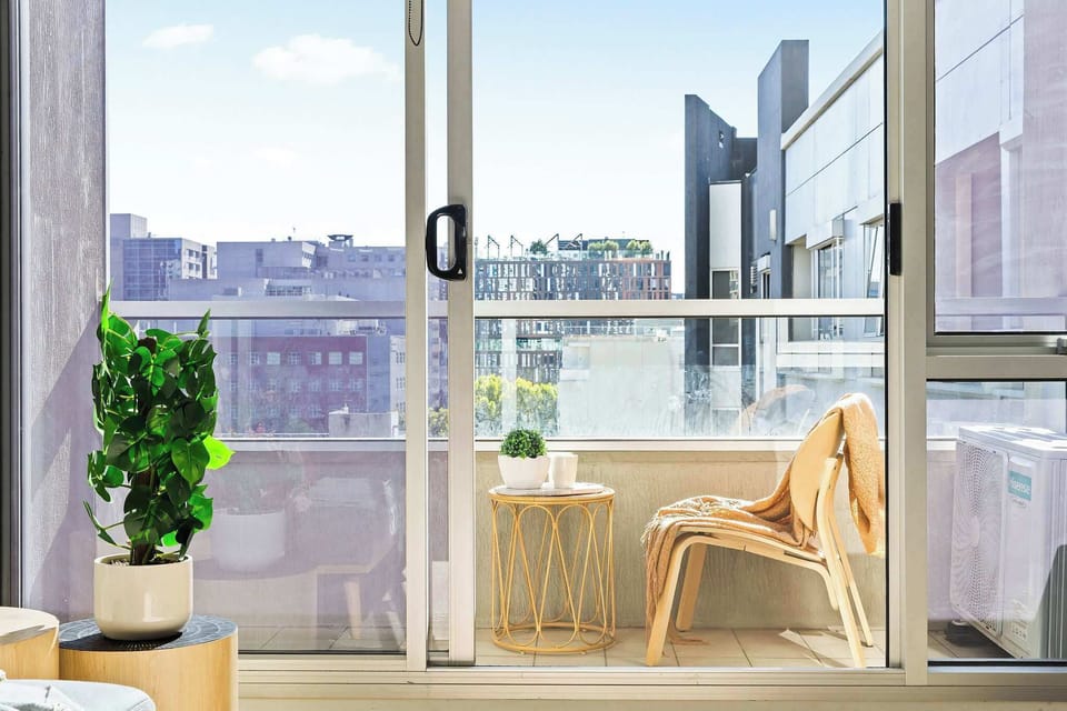 A private balcony. (*Chair and side table is from the living area).