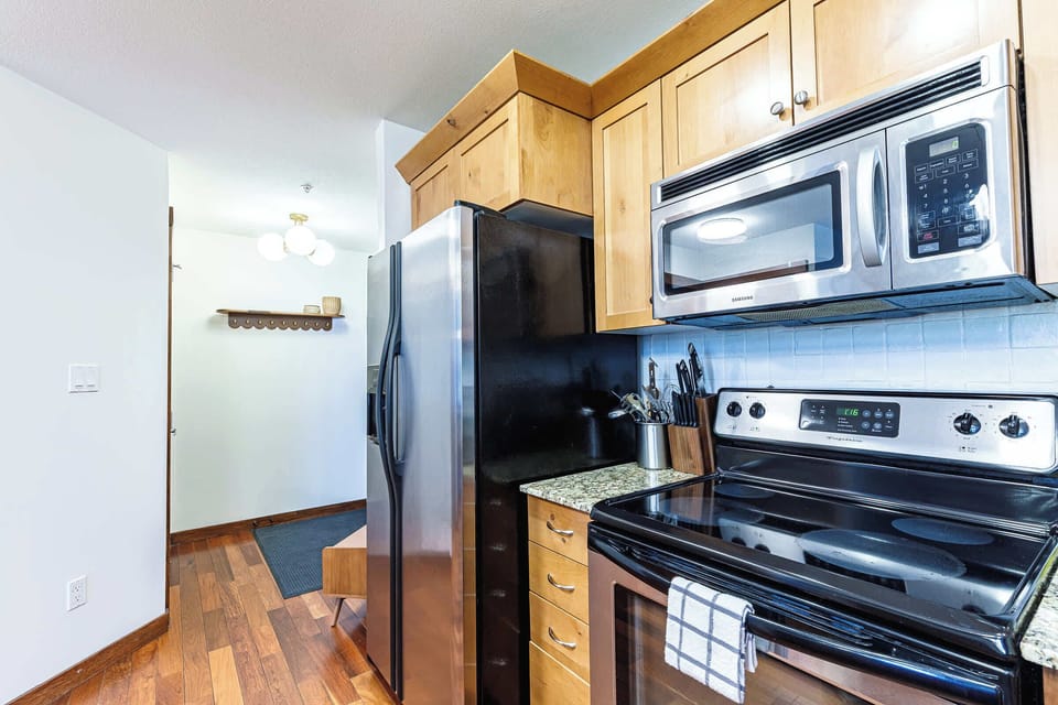 Step into a fully equipped kitchen that greets you with style, warmth, and effortless comfort.