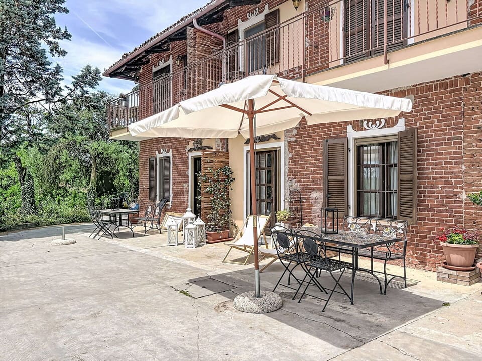 Furniture, Door, Outdoor Furniture, Chair, Home, Umbrella, Outdoor Table, Shade, Balcony, Kitchen & Dining Room Table