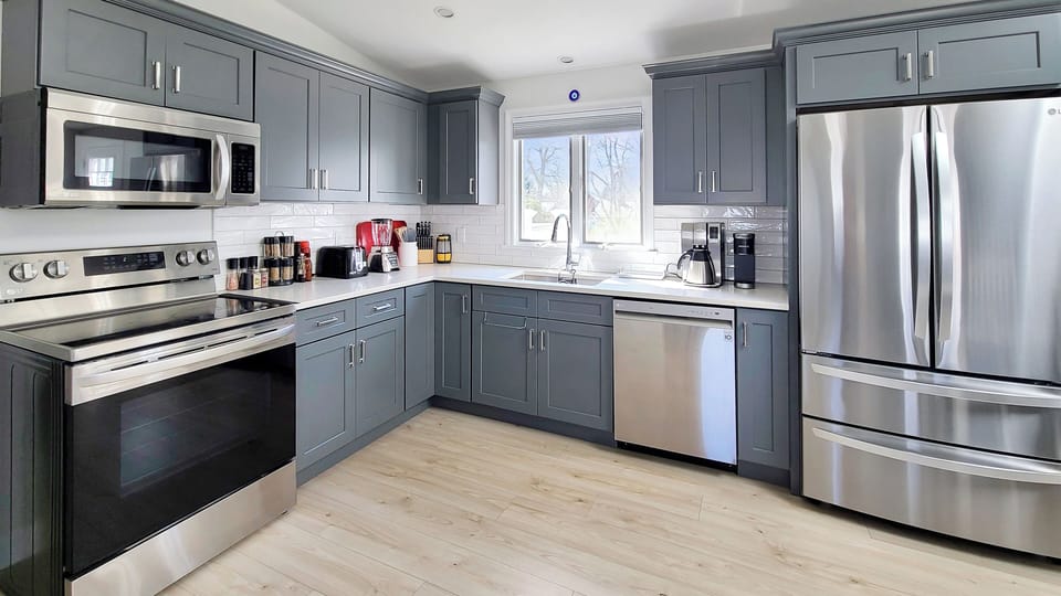 Nicely equipped kitchen with stainless appliances