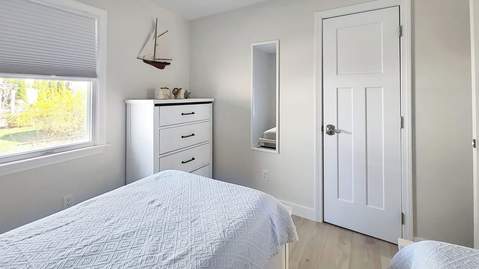 First floor bedroom with two twin beds