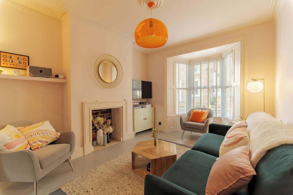 Living room, at the front of the house with smart  TV, games, Bluetooth speaker, heating thermostat. 