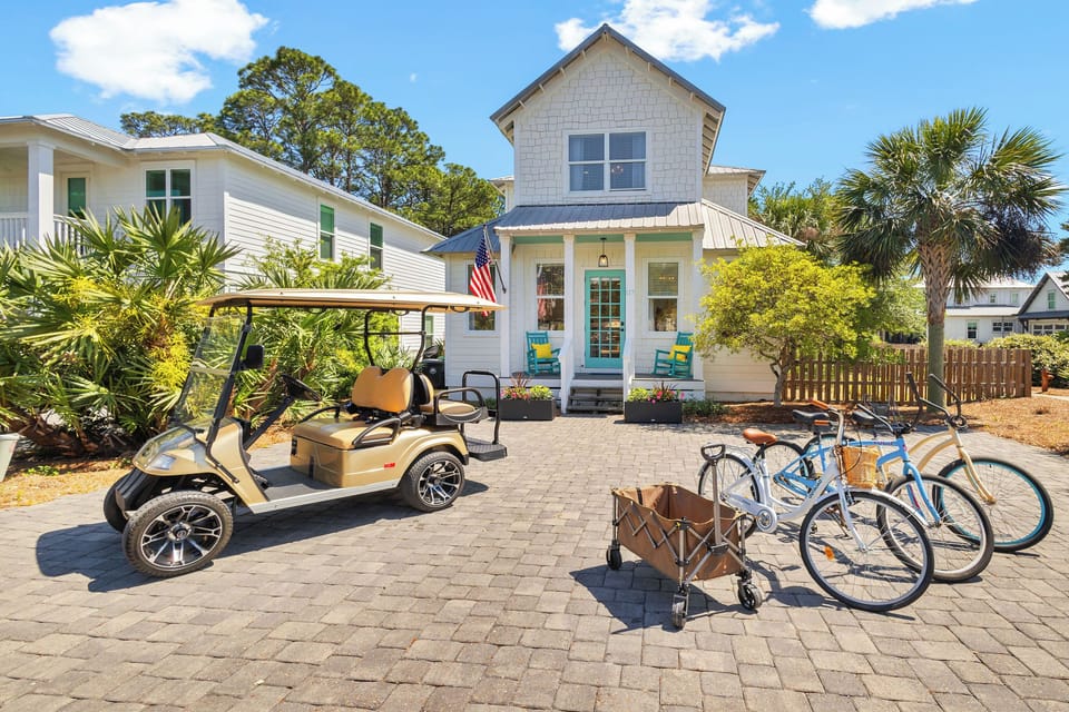 Arrive, unload, and let the beach days begin — golf cart and bikes included.