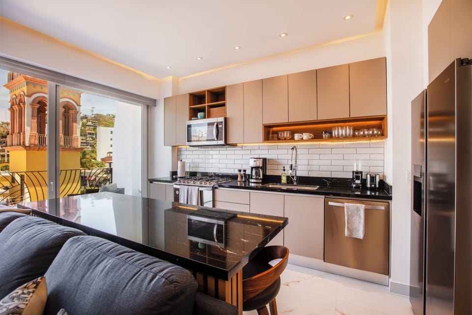 Sleek kitchen—fully-equipped with modern appliances