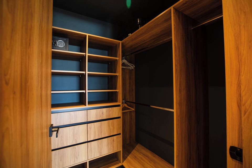 Spacious walk-in closet with safe for your valuables