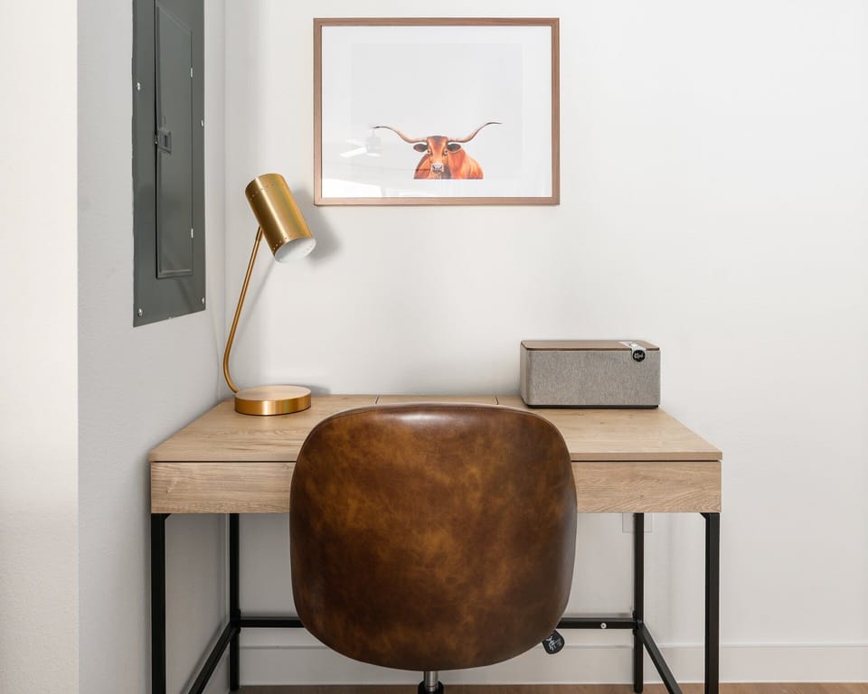 Stay productive in the dedicated desk area with ample natural light.