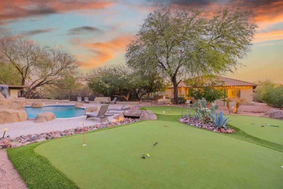 Practice your short game on private putting greens with sunset desert views