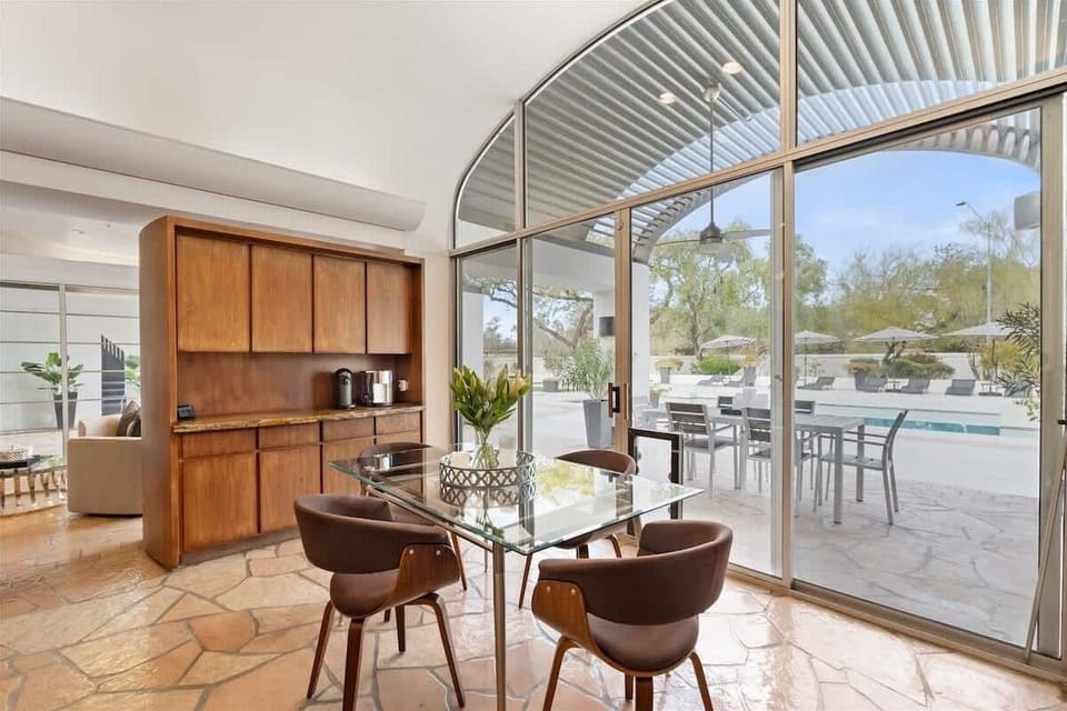 Breakfast nook opens to the covered patio for easy indoor-outdoor dining