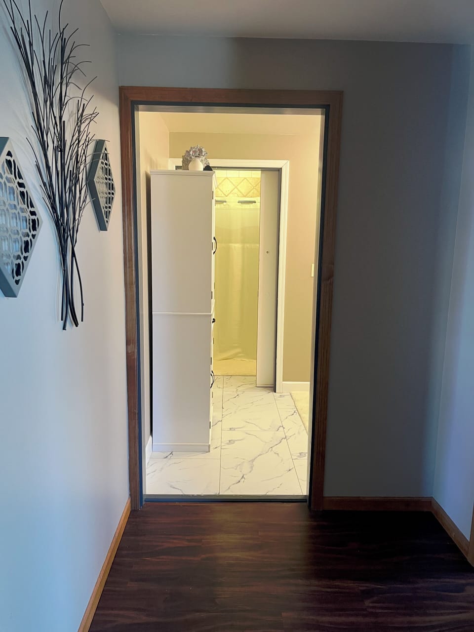 Hallway and entrance to bathroom