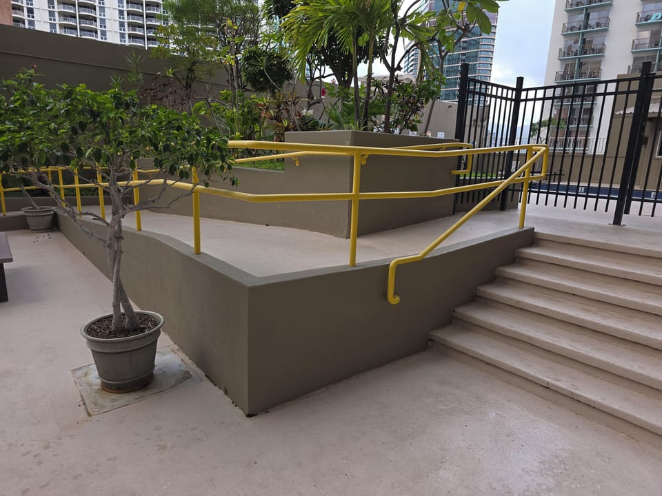 access astairs and ramp to pool area located on 5th floor 