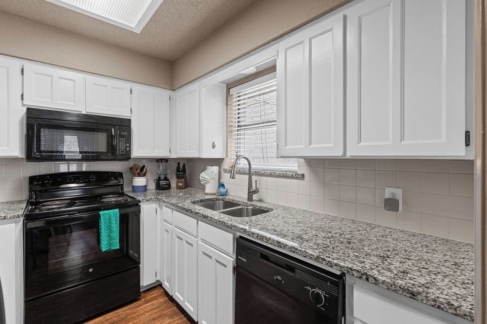 Bright and airy kitchen, ready for your next meal prep!