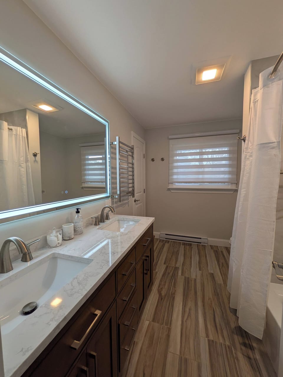 2nd floor bathroom w double vanity, tower warmer, quiet fan