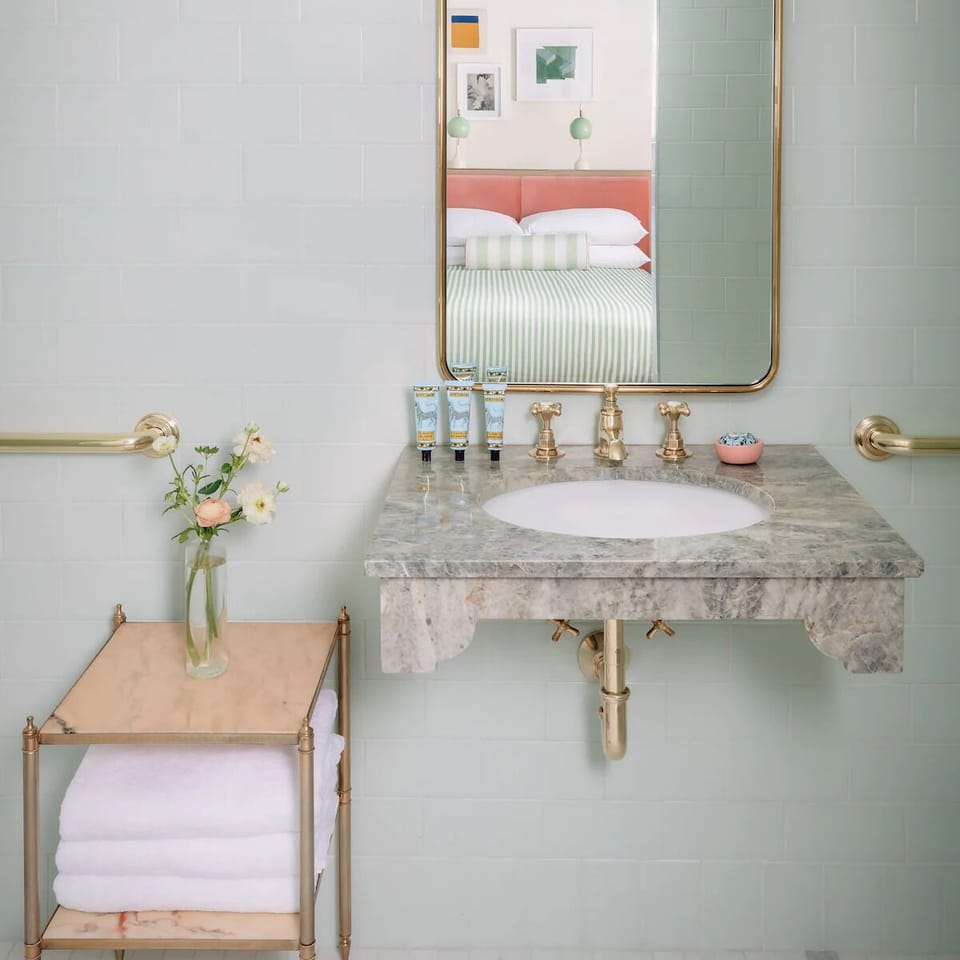 Refresh at a marble vanity with luxe, spa-like details.