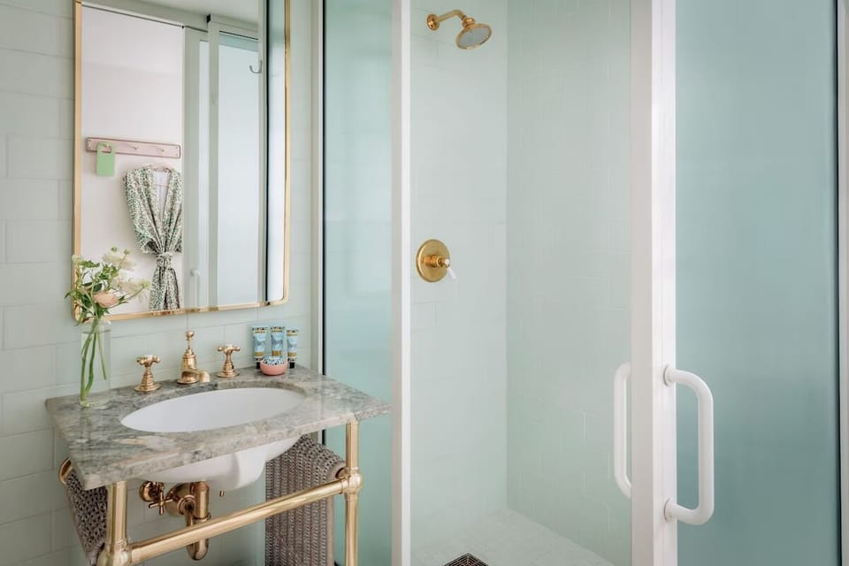 Refresh under the spacious rainfall shower with spa-like calm.