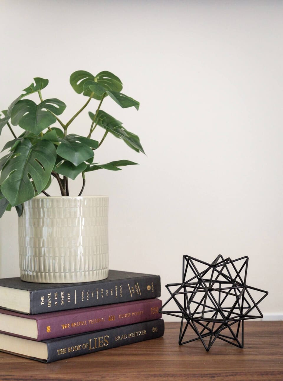 Modern decor and greenery create a serene and upscale atmosphere.