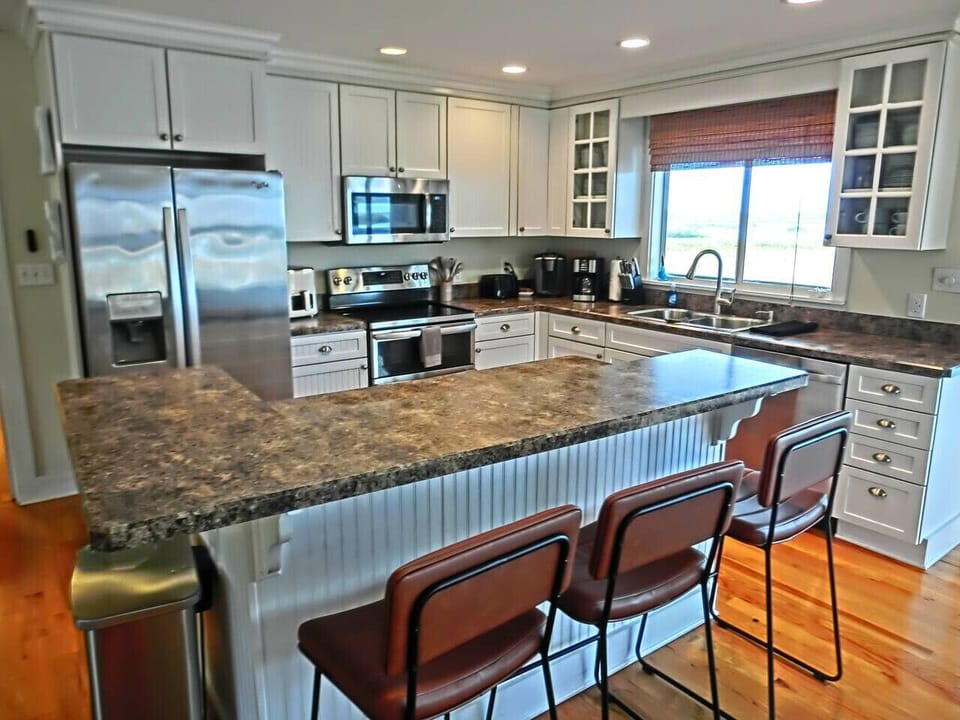 Freshly Updated Kitchen With Stainless Steel Appliances