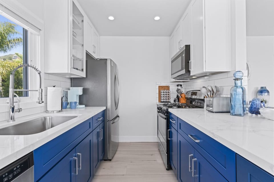 Spacious kitchen with a scenic view, perfect for cooking and gathering.