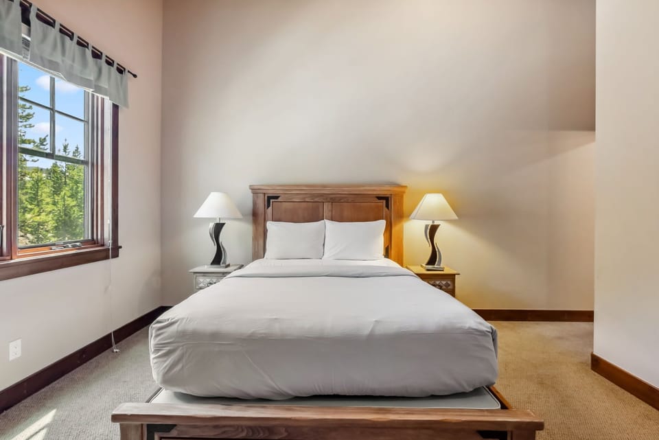 Bedroom 3: Queen bed, gas fireplace, upper floor, en-suite bathroom with freestanding tub, walk-in closet