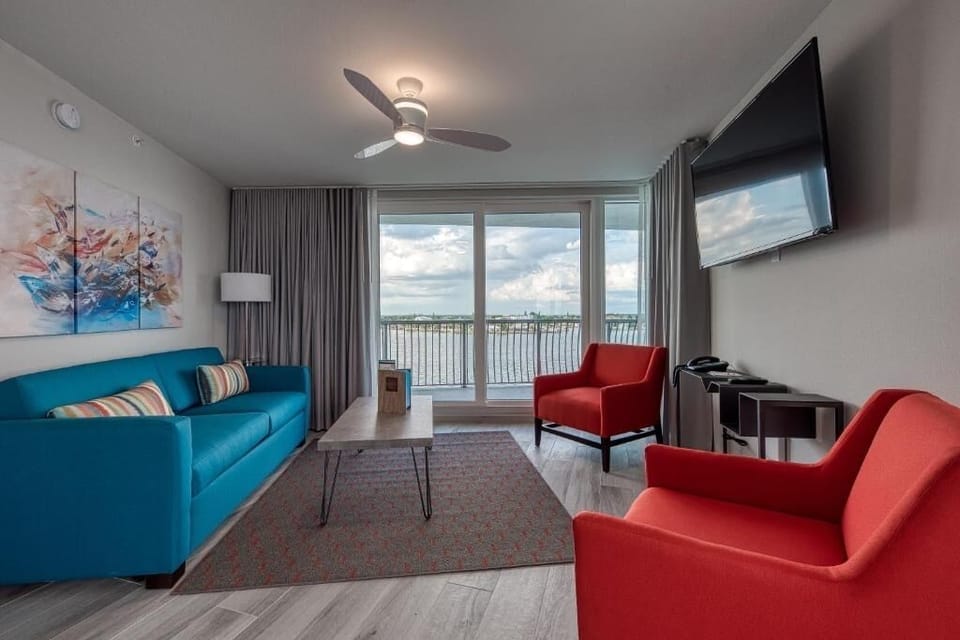 Wake up to bay breezes through your private balcony doors.