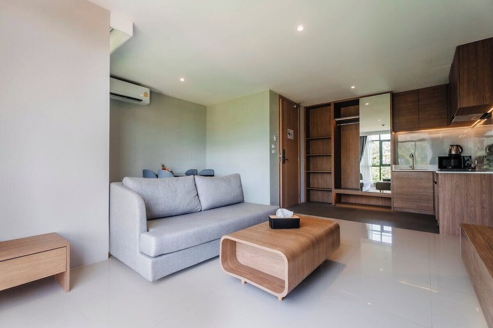 Spacious open-plan living room with kitchen and dining area included.