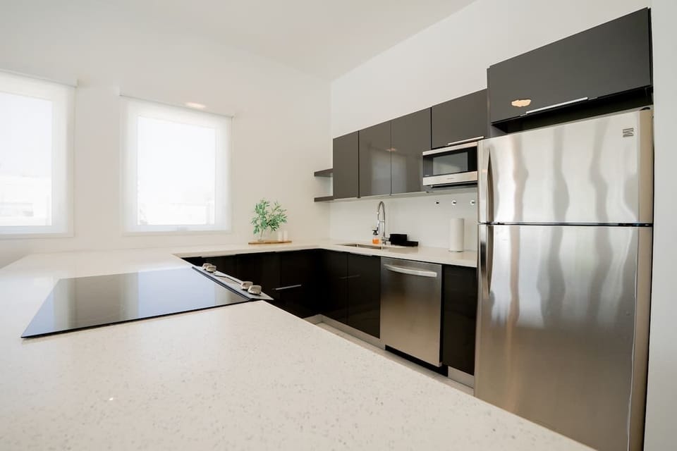 Modern appliances and generous counter space make meal prep effortless.