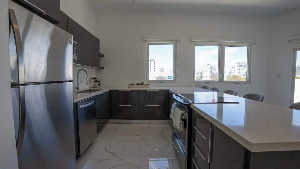 Cook with ease using generous counter space and modern appliances.